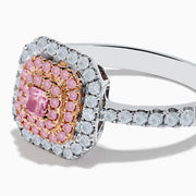 The 18K Two Tone Gold White and Pink Diamond Ring showcases a square pink diamond center, double rows of pink diamonds, an outer border of round white diamonds, and additional diamonds set along the band.