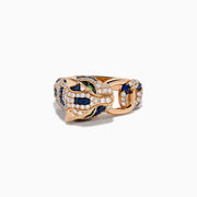 The Signature 14K Rose Gold Diamond, Sapphire and Emerald Ring features a panther’s head encrusted with white diamonds, blue sapphires, and green emeralds, with the panther biting a ring in its mouth.