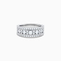 The 14K White Gold Channel Set Diamond Wide Band Ring features three rows of round diamonds, with five larger channel-set stones in the center and smaller diamonds on either side, creating an elegant, eye-catching look.