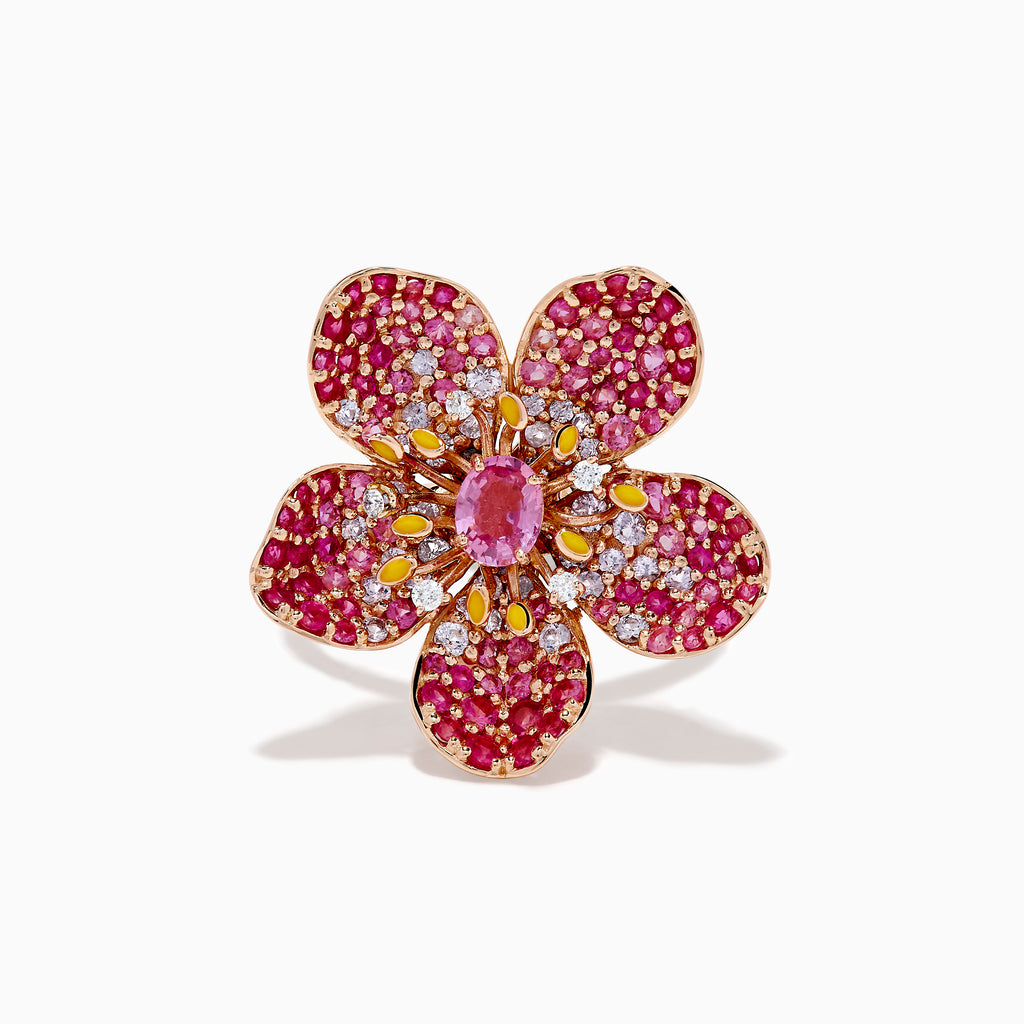 The Nature 14K Rose Gold Pink Sapphire and Diamond Flower Ring features a floral design with five petals, small pink and red gemstones, a central oval pink sapphire, and shimmering rose gold outlining for added sparkle.