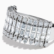 The 14K White Gold Baguette and Round Diamond Statement Ring features multiple rows of sparkling diamonds in a symmetrical, luxurious design, displayed elegantly against a white background.