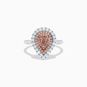 The 18K Two Tone Pear Shape Pink and White Diamond Halo Ring showcases a pear-shaped center, double halos of pink and white diamonds, and a slim two-tone band, set against a white background.