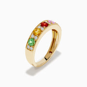 The Watercolors 14K Yellow Gold Multi Sapphire and Diamond Band features green, yellow, red, pink, and blue sapphires with sparkling white diamonds along the band, shown against a white background.