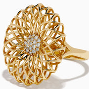The 14K Yellow Gold Diamond Filigree Sunburst Statement Ring showcases a layered floral design with central sparkling diamonds, capturing the look of a blooming sunburst flower.