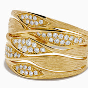 The 14K Yellow Gold and Diamond Textured Multiband Wave Statement Ring features a wavy, layered design with multiple rows of small round white diamonds set in marquise-shaped patterns.
