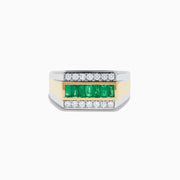 The Men's Two Tone Gold Channel Set Emerald and Diamond Signet Ring showcases a row of square-cut emeralds bordered by rows of round diamonds, blending elegance and bold style.
