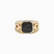 The Men's 14K Yellow Gold Black Diamond Signet Ring features a chunky band and an octagonal face set with small black diamonds, displayed against a white background.