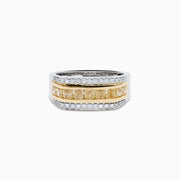 The Men's 14K Two Tone Channel Set Yellow and White Diamond Ring features a wide band with yellow rectangular gemstones in gold, bordered by channel set round white diamonds in white gold or silver.