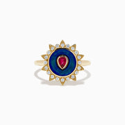 The 14K Yellow Gold Ruby, Diamond, and Enamel Ring showcases a central teardrop ruby, a blue enamel circle, and an outer border of round diamonds in a sunburst design.