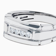 The Men's 14K White Gold Diamond Channel Set Ring showcases a modern geometric design with four small round diamonds set horizontally on the front.