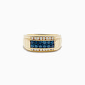 The Mens 14K Yellow Gold Blue and White Diamond Ring features a rectangular center, two rows of white diamonds, and a striking blue gemstone row—a bold choice for a distinctive look.