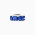 The Nahla Siri 925 Silver Tanzanite Ring showcases five large, cushion-cut tanzanite gemstones set in a row, displayed against a plain white background.