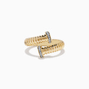 The DOro 14K Yellow Gold Diamond Bypass Ring features a ribbed, coiled design with open ends capped by small vertically set diamonds, shown on a plain white background.