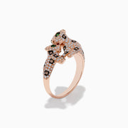 The Signature 14K Rose Gold Diamond Double Panther Ring features a sleek, diamond-encrusted panther design with black spots and green gemstone eyes, elegantly wrapping around your finger.