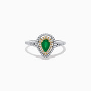 The 14K White and Yellow Gold Pear Shaped Double Diamond Halo Emerald Ring features a vivid emerald center, surrounded by white and yellow diamond halos, with a diamond-adorned band for extra brilliance.