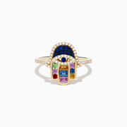 The Novelty 14K Yellow Gold Multi Color Sapphire and Diamond Hamsa Ring features a hand design with diamonds, blue gemstones, and square-cut sapphires in red, green, yellow, and purple on a white background.