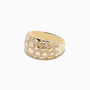 The Doro 14K Yellow Gold Animal Print Diamond Ring features a wide band with an irregular pebble pattern and sparkling diamonds, creating a textured, luxurious animal print-inspired look.