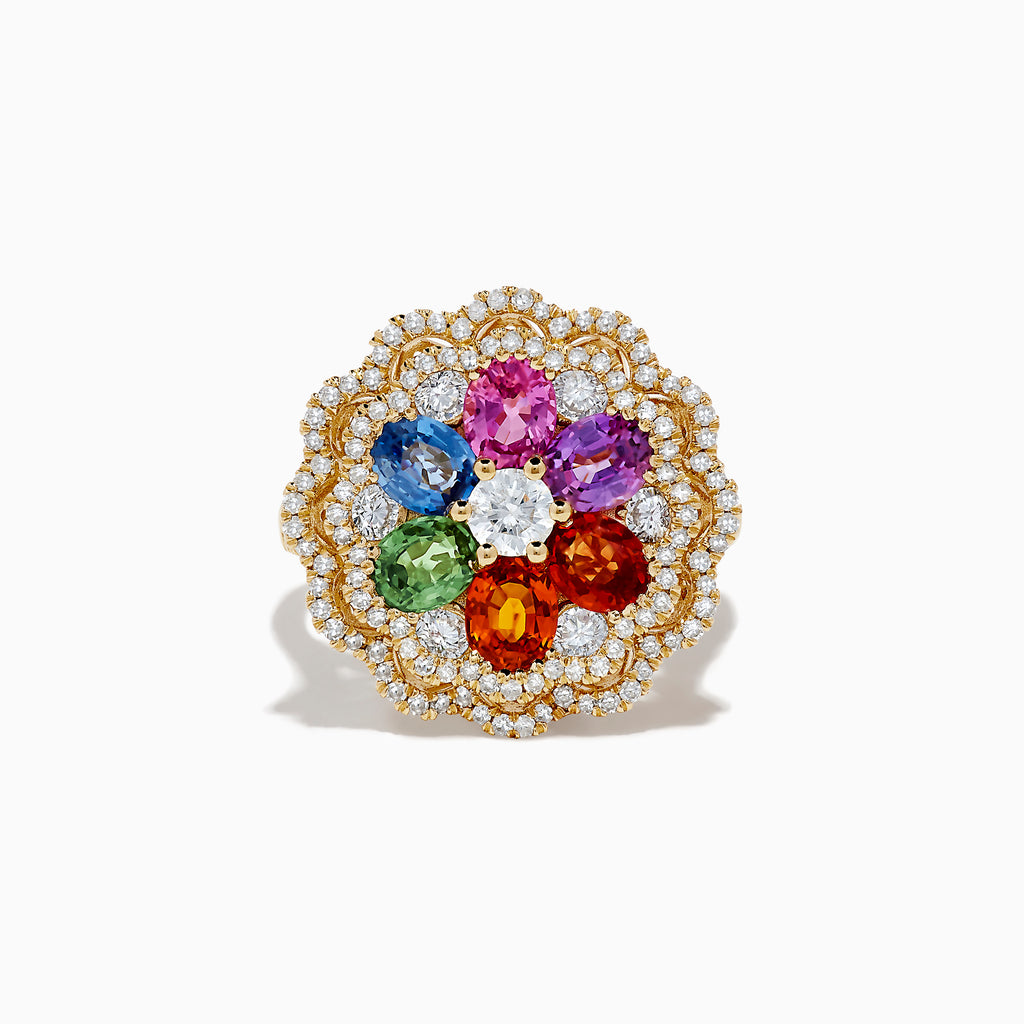 The Watercolors 14K Yellow Gold Multi Sapphire and Diamond Ring features a flower design with sapphire petals, a central white gemstone, and two diamond layers in a scalloped border.