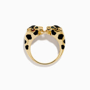The Signature 14K Yellow Gold Diamond and Natural Emerald Ring features two panther heads with black and green enamel details, facing each other and joined at the center by a diamond-studded link.