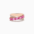 The 14K Rose Gold Pink Sapphire and Diamond Criss Cross Ring features a crisscross design set with rectangular pink sapphires and small round diamonds for an elegant, modern look.