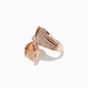 The Pave Rose 14k Rose Gold Diamond Leaf Ring features overlapping leaf designs with sparkling white diamonds and intricate textured details for a stunning, elegant look.