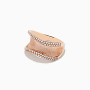 The Pave Rose 14k Textured Rose Gold Diamond Ring features gently wavy edges, two rows of sparkling diamonds on the borders, and a brushed central surface.
