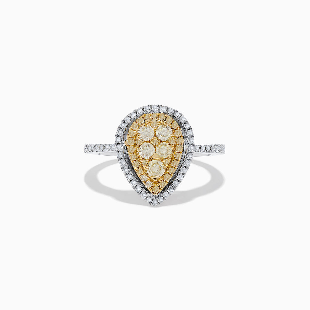 The Canare 14K Two Tone White and Yellow Diamond Ring showcases clustered yellow diamonds encircled by a double halo of white diamonds, set on a diamond-studded silver band for a striking, elegant look.