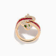 The Safari 14K Rose Gold Ruby Diamond and Tsavorite Snake Ring features a coiled serpent design with white diamonds, tsavorite green gemstone eyes, and a band set with rectangular ruby-red gemstones.