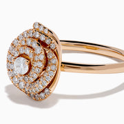 The Pave Rose 14K Rose Gold Diamond Rose Ring showcases a central round diamond encircled by concentric pave-set diamonds, creating an elegant spiral floral design.