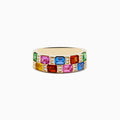 The 14K Yellow Gold Multi Sapphire and Diamond Ring features a wide band adorned with rectangular sapphires in pink, blue, green, yellow, and orange, arranged in two vibrant rows around the band.