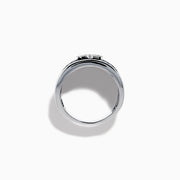 The Sterling Silver Blue Sapphire and Diamond Anchor Ring showcases a striking anchor center in clear stones, set on a white background with blue sapphires for added elegance.