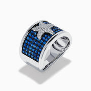 The Sterling Silver Blue Sapphire and Diamond Starfish Ring features a white starfish with clear crystals set among round blue sapphires atop a wide, curved band for a unique and stylish look.