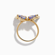 The Nahla 14K Yellow Gold Tanzanite and Diamond Butterfly Ring features blue tanzanite wings and diamond accents on the edges and body, shown against a white background.