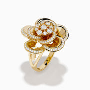 The 14K Yellow Gold Diamond Pave Bloom Ring features a flower design with overlapping diamond-outlined petals and larger center diamonds, showcased on a white background.