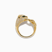 The Signature 14K Yellow Gold Diamond Panther Ring features a panther’s head with diamond accents, green gemstone eyes, black detailing, and a ring held in its mouth.