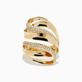 The 14K Yellow Gold Diamond Sculptural Ribbon Statement Ring features overlapping polished and diamond-encrusted bands, creating a dazzling, sculptural look.