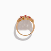 The 14K Rose Gold Ruby, Pink Sapphire, and Diamond Statement Ring showcases a geometric honeycomb design with oval red gemstones and sparkling diamonds, beautifully displayed on a white background.