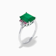 The 14K White Gold Emerald, Pink Sapphire, and Diamond Ring features a vibrant green emerald accented by pink sapphires and diamonds in modern geometric settings for an elegant look.