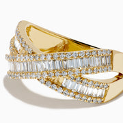 The D'Oro 14K Yellow Gold Diamond Criss Cross Ring showcases wide, polished bands crossed with baguette-cut diamonds and bordered by round diamonds for a dazzling look.