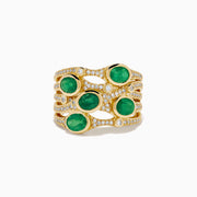 The 14K Yellow Gold Bezel Emerald and Diamond Multi Row Ring features five round green emeralds set in separate bands, accented with white diamonds and intricate detailing for a striking design.