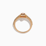 The 14K Rose Gold Brown and White Diamond Marquise Halo Ring features a marquise-cut brown and white diamond centerpiece, accented by round diamonds in a halo and along the band.