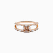 The Espresso 14K Rose Gold Brown Diamond Ring showcases a rectangular cushion-cut center stone, haloed by diamonds, and features a double band adorned with sparkling brown diamonds.