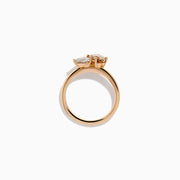 The 14K Rose Gold Brown and White Diamond Toi et Moi Ring features two side-by-side round diamonds—one brown, one white—set on a simple gold band.