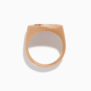The Espresso 14K Rose Gold Brown and White Diamond Signet Ring showcases a round brown and white diamond on the left and three vertical rectangular white gemstones on the right of its flat top.