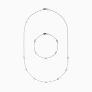 The Pave Classica 14K White Gold Diamond Bezel Station Necklace and Bracelet Set features small, evenly spaced round diamond accents, beautifully displayed on a plain white background.