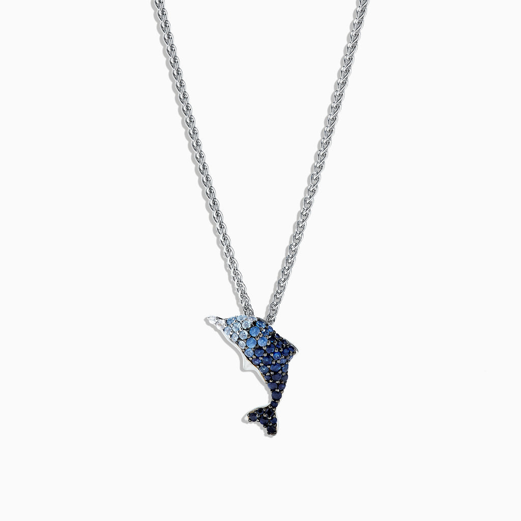 The 925 Sterling Silver Sapphire Splash Dolphin Pendant (1.30 TCW) necklace features a dolphin pendant with sapphire-blue gemstones, shown on a white background.