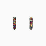 A pair of 925 Sterling Silver Multi Sapphire Splash Hoop Earrings, 1.98 TCW, featuring rows of colorful gemstones in dark metal, displayed on a white background.