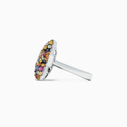 The 925 Sterling Silver Multi Sapphire Splash Starfish Ring, 2.90 TCW, features a starfish design set with vibrant blue, yellow, orange, pink, and clear sapphires—an Effy piece that dazzles against a white backdrop.