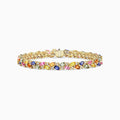 The Watercolors 14K Gold Multi Sapphire & Diamond Bracelet, 11.09 TCW, features a leaf-like design set with marquise-cut sapphires in pink, blue, green, yellow, and orange.