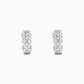 A pair of 925 sterling silver diamond earrings, featuring three rows of sparkling round diamonds totaling 0.33 TCW, shown against a plain white background.